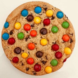 Indulge in 12 handcrafted M&M gourmet cookies